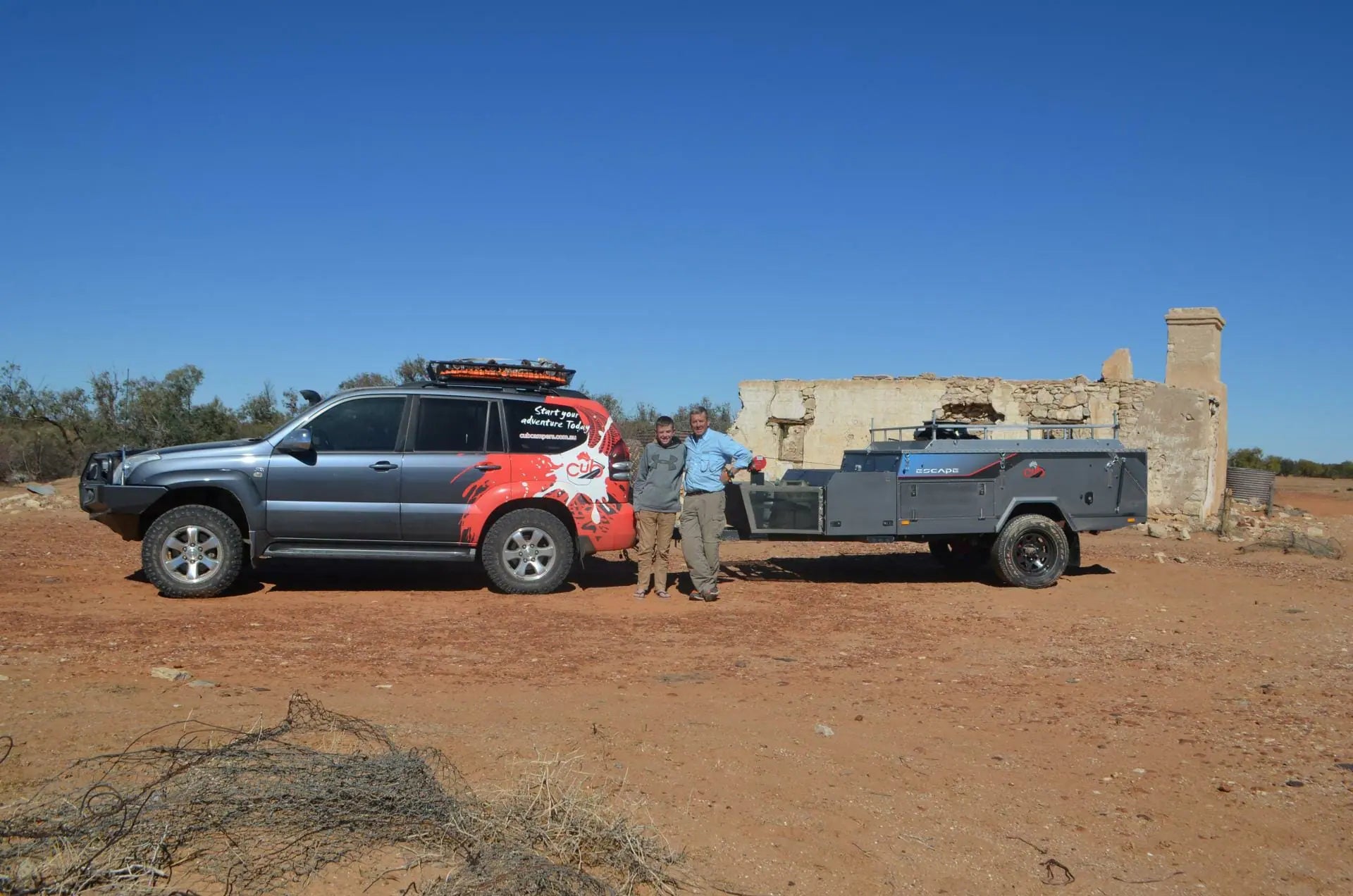 Father and son trek to the Big Red Bash in a Cub Escape